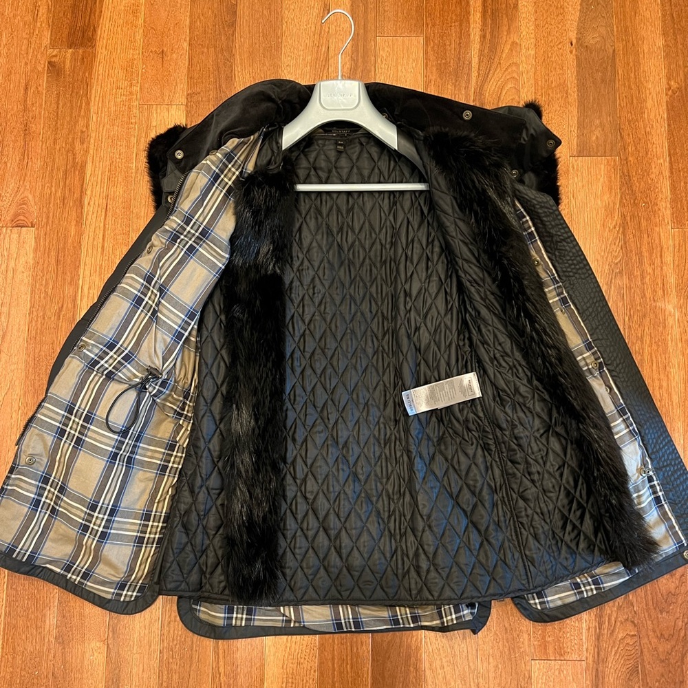 Beautiful waxed coat, removable quilted inner coat. 2 way zipper & beaver trim.